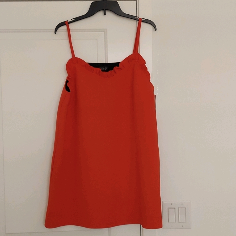 Sleeveless mini dress with side pockets